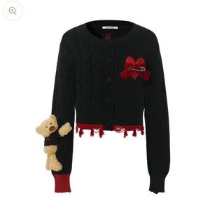 black & red sweater with bear
